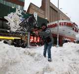 Millions of Americans, digging out after  deadly snowstorm, face days of bitter cold